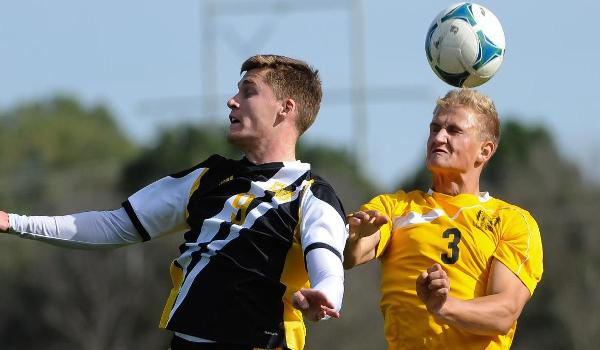 Bellevue's Alan Carr (right) and Adam Wood battle for a header in the MCAC Game of the Week
